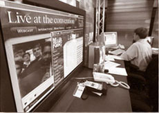 Media employees work on their Web site at the Democratic convention, August 17, 2000, in Los Angeles.